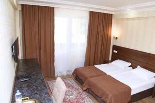 Отель Rabat Hotel Алматы Двухместный номер с 2 отдельными кроватями и собственной ванной комнатой-6